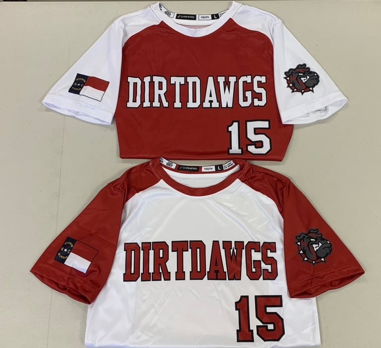 Two DIRTDAWGS raglan baseball jerseys in red and white with number 15, displayed front and back views