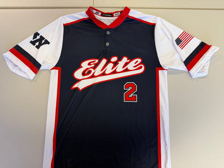 Navy blue and white sports jersey with Elite team name, number 2, red stripes, and American flag patch on sleeve